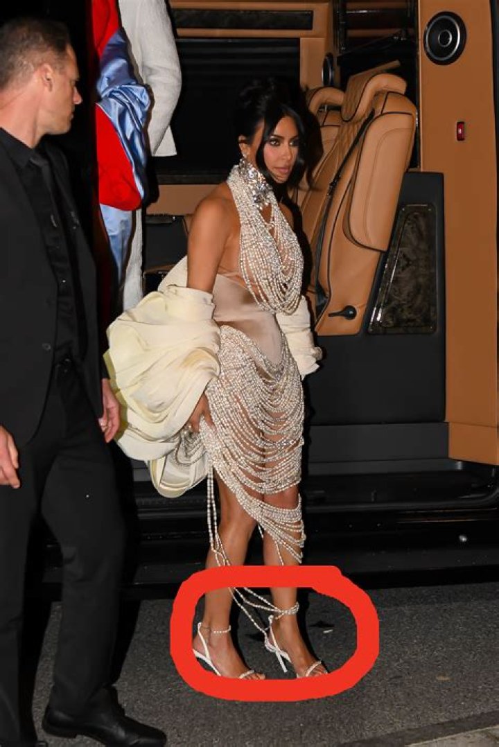 Kim Kardashian Risks Wardrobe Malfunction In Black Dress With Cutouts – Hollywood Life