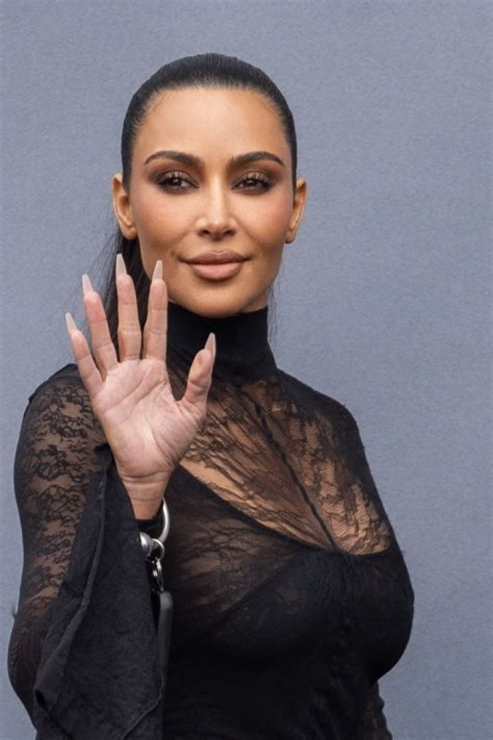 Kim Kardashian Shows Off Major Cleavage In Braless Instagram Pic Wearing New Grill