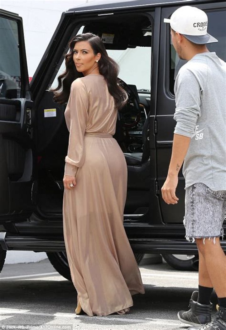 Kim Kardashian Sizzles In Beige Crop Top & High Slit Skirt For Revolve’s Coachella Party: Photos