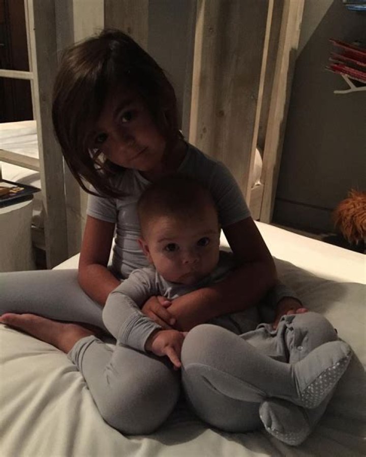 Kim Kardashian Snuggles With Nephew Reign, 5, As The Cousins Enjoy A ’Sleepover’ — See Pic