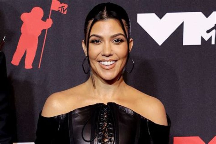 Kourtney Kardashian, 40, Stuns In Charcoal Tank Top While Out With Pal Fai Khadra