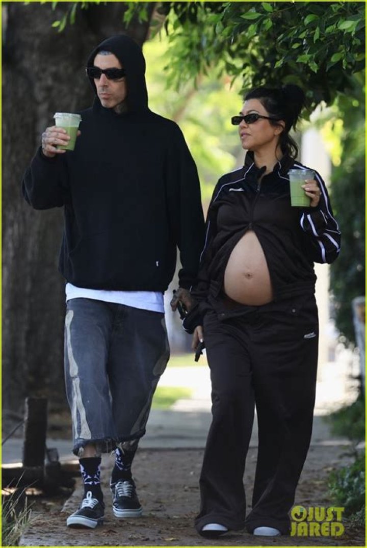 Kourtney Kardashian Shows Off Her Bare Baby Bump While Floating In The Water During Beach Getaway
