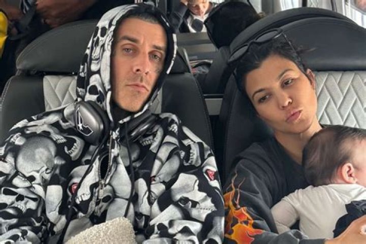 Kourtney Kardashian & Travis Barker Are A Clone Couple In Matching Sweatsuits: Photo