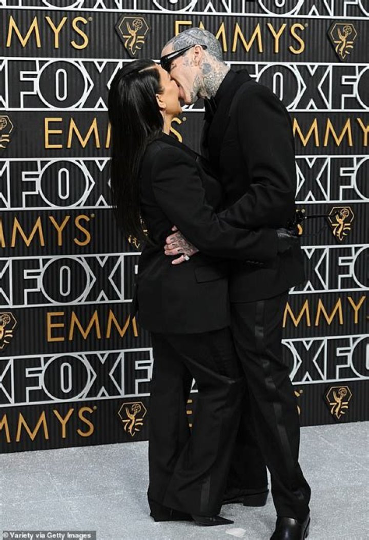 Kourtney Kardashian & Travis Barker Kiss In New Photos From ‘Romeo & Juliet’ Bach Parties