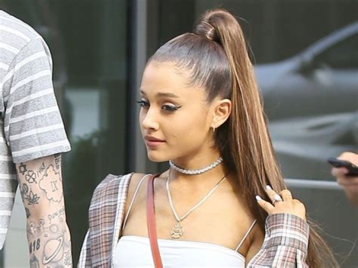 Kylie Jenner Mirrors Sister Khloe’s Ariana Grande Ponytail Look In Crop Top & Jeans: ‘Felt Cute’