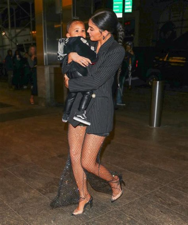 Kylie Jenner Rocks Pinstripe Jacket & Shows Off Her Legs In Sheer Pants On Night Out In NYC