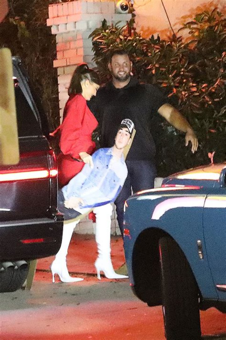 Kylie Jenner’s Red Mini-Dress & White Boots For Zack Bia’s Birthday Party – Hollywood Life