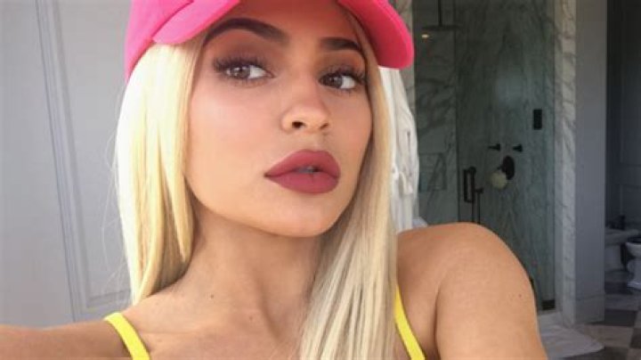 Kylie Jenner Sizzles In Tiny Yellow Bikini — Your Favorite Ever? VOTE