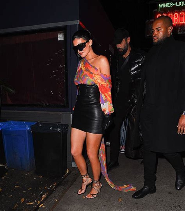 Kylie Jenner Slays In High Waisted Black Leather Mini & Off The Shoulder Blouse For Dinner in NYC – Photos