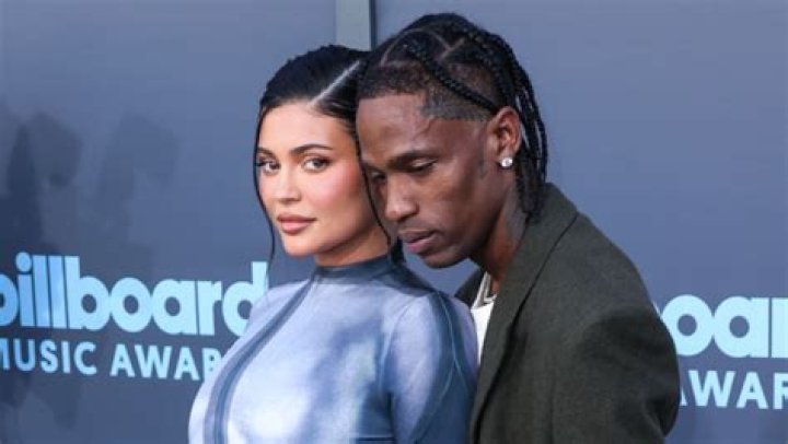 Kylie Jenner Snuggles Up To Travis Scott At Mom Kris’ Birthday: Rare Photo