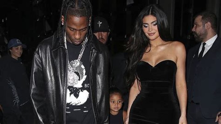 Kylie Jenner & Travis Scott Hold Hands With Stormi On Rare Public Outing Together