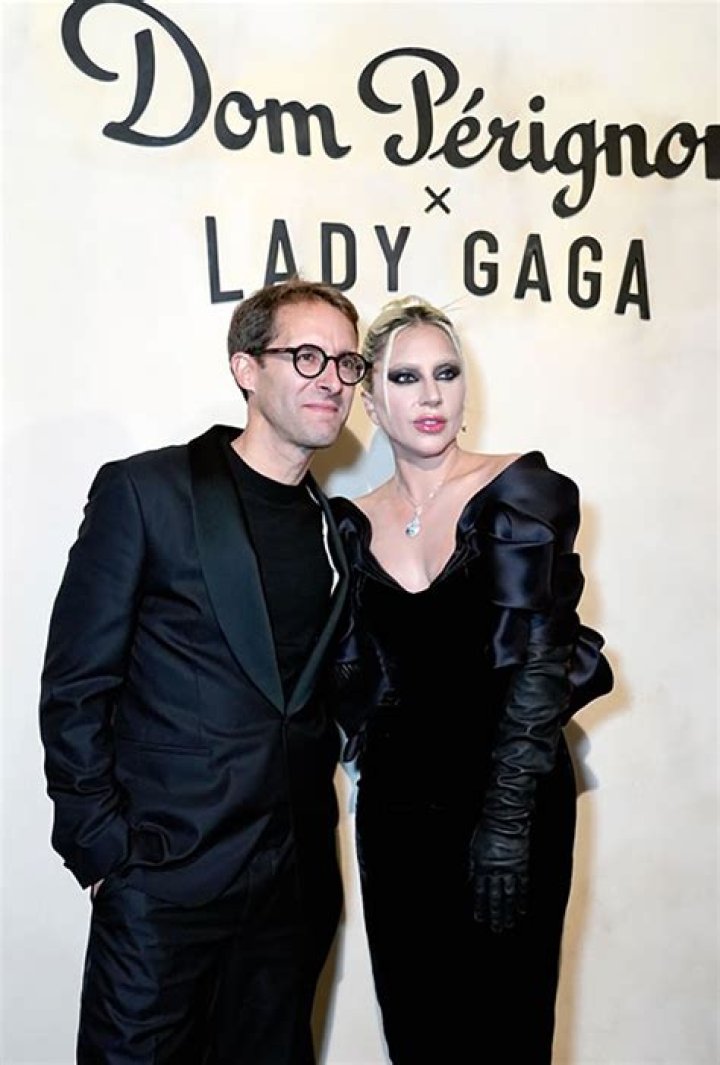 Lady Gaga Rocks Ripped Fishnet Stockings & Ghostly Makeup To Dom Perignon Event