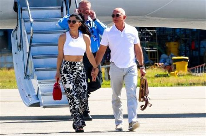 Lauren Sanchez Wears Crop Top Arriving With Jeff Bezos In Miami After Caribbean Vacation: Photos