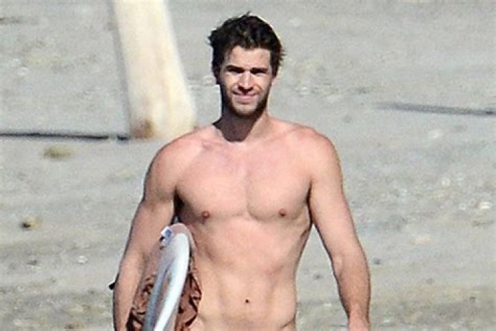 Liam Hemsworth Looks Ripped In Shirtless Photo From Brother Chris’ 32nd Birthday Tribute