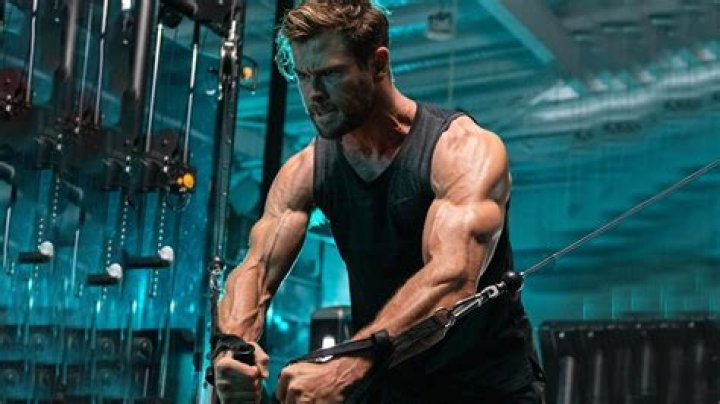 Liam Hemsworth Reveals Incredible Bulging Biceps In White Tank Top After Intense Workout