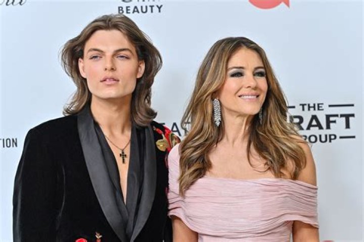 Liz Hurley’s Gorgeous Son Damian Wears Safety Pin Versace Look Paying Homage To Mom’s Famous Gown