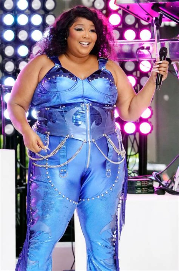 Lizzo Sizzles Rocks Pastel Thong Underneath Sheer Pink Jumpsuit In Sexy New Video
