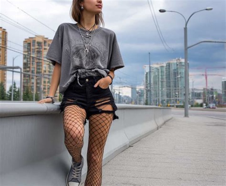Madonna Pairs Corset Top & Shorts With Fishnets For Sexy New Photos