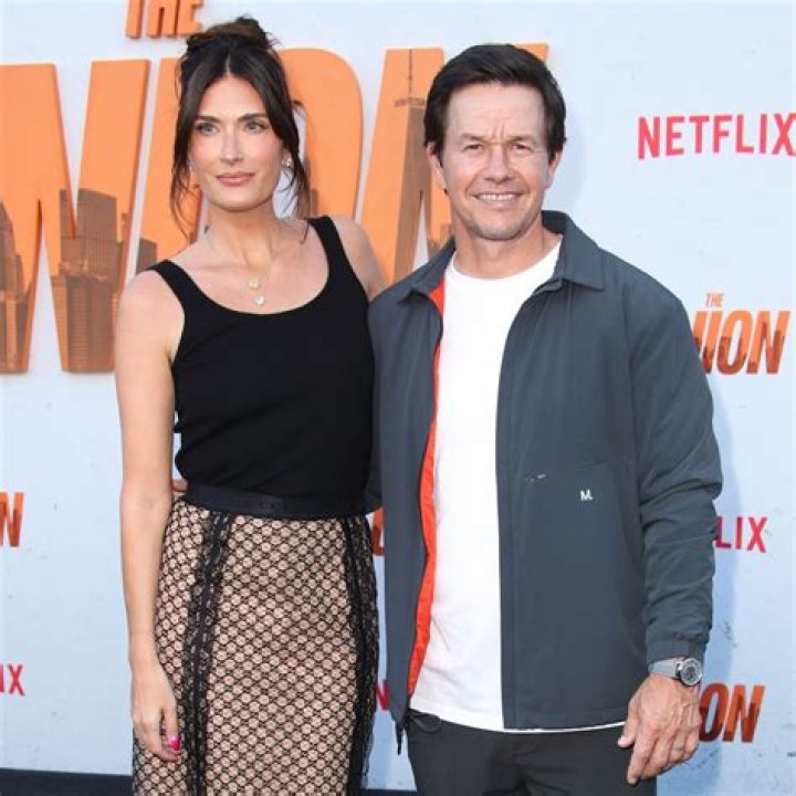 Mark Wahlberg’s Wife Rhea Durham Enjoys A Swim In Tie-Dye Swimsuit On Romantic Barbados Vacay