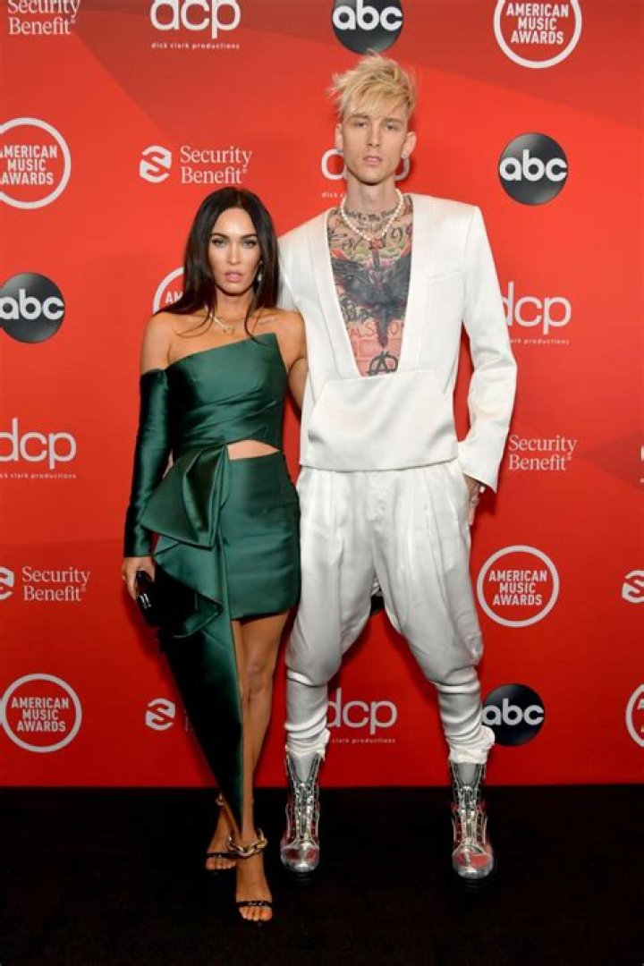 Megan Fox Cozies Up To Machine Gun Kelly As They Celebrate His New Album: Plus More Of Their PDA Pics