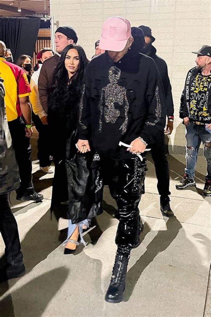 Megan Fox Rocks Leather & Rhinestone Heels As She Holds Hands With MGK At Kanye West & Drake Concert