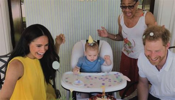 Meghan Markle Cradles Archie, 4 Mos., As Royal Family Arrives In South Africa For Press Tour