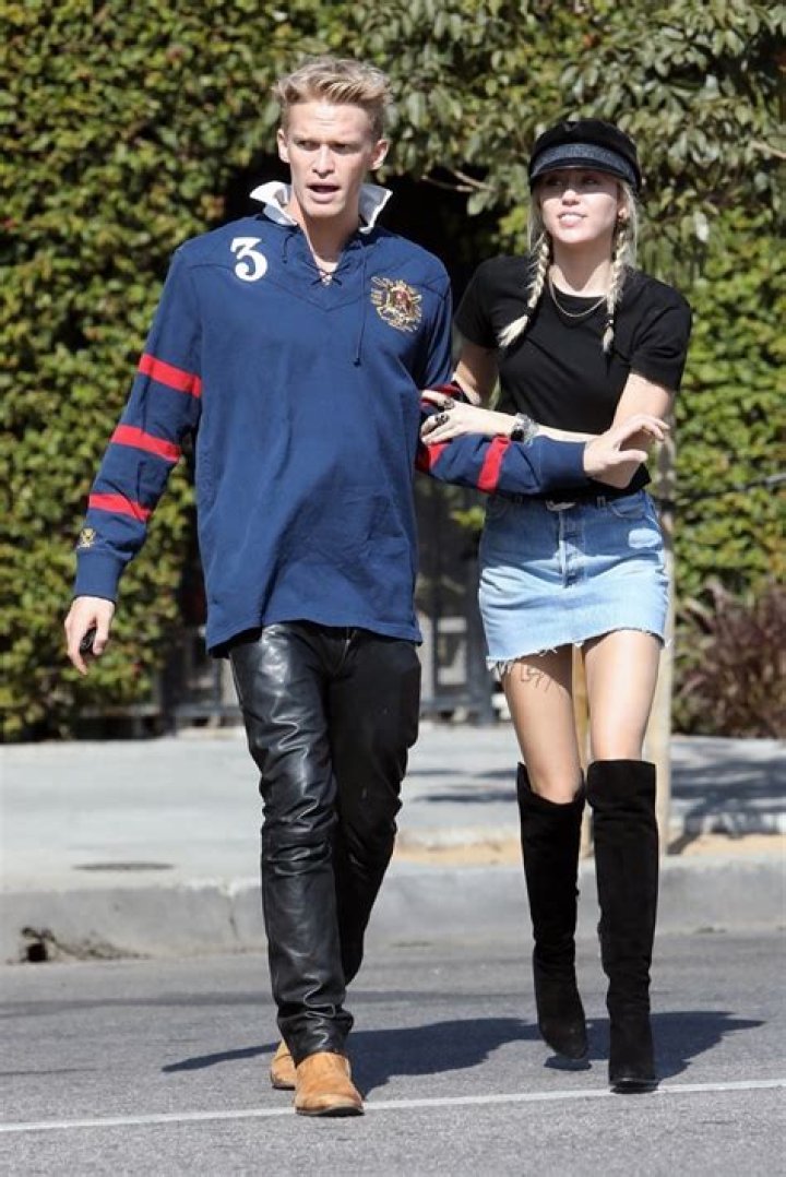 Miley Cyrus & Cody Simpson Lock Arms & Smile At One Another During Romantic Outing — Pics