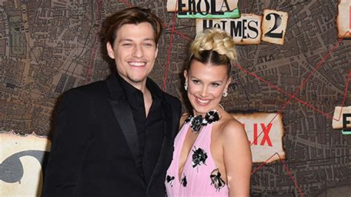 Millie Bobby Brown Hilariously Smashes Birthday Cake & Snuggles Up With Fiance Jake Bongiovi in New 20th Birthday Photos