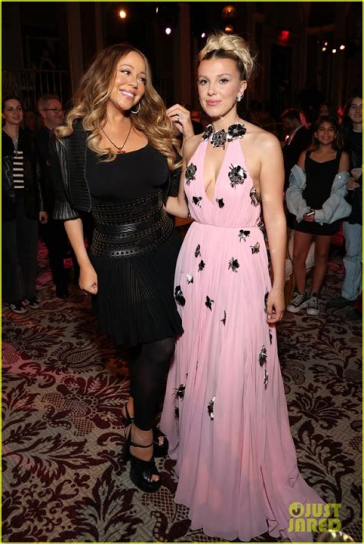 Millie Bobby Brown Hugs Mariah Carey At ‘Enola Holmes 2’ Premiere After Dishing About Their Friendship