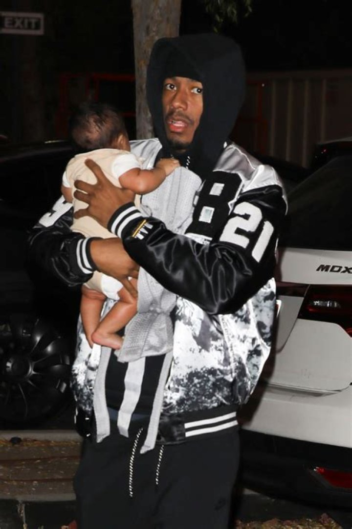Nick Cannon Snuggles Son Rise, 1 Month, Attending Golden’s, 5, Basketball Game: Photos