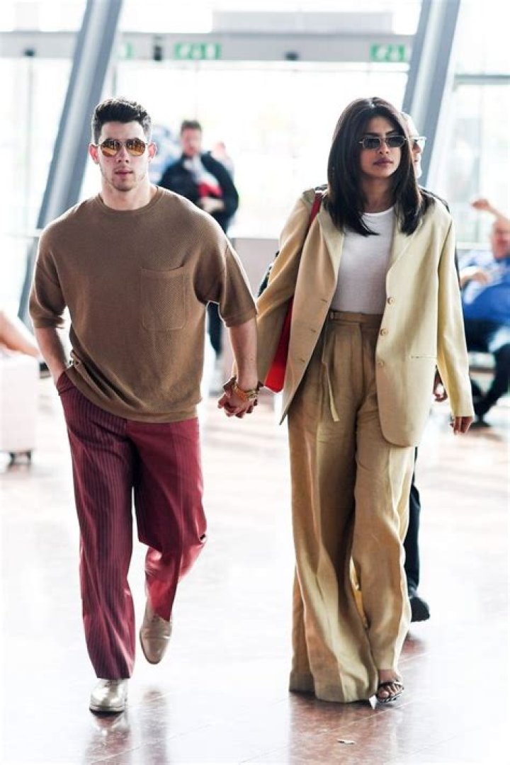 Nick Jonas & Priyanka Chopra Are Twinning In NYC With Matching Orange Clothing — Pics