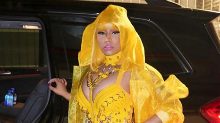 Nicki Minaj Flaunts Major Cleavage & Yellow Hair In Sexy Chain Link Bodysuit — See Pic