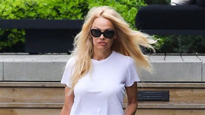Pamela Anderson Rocks White Swimsuit For ‘Maxim’ Photo Shoot – Hollywood Life