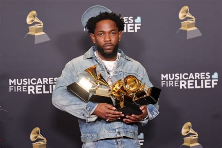 Photos Of The Grammy Award-Winning Singer – Hollywood Life