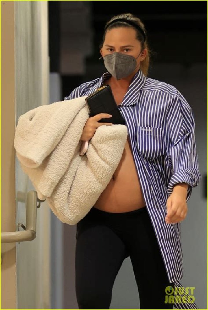 Pregnant Chrissy Teigen Shows Off Bare Bump In Bikini As Son Miles, 4, Swims In Cute Photo