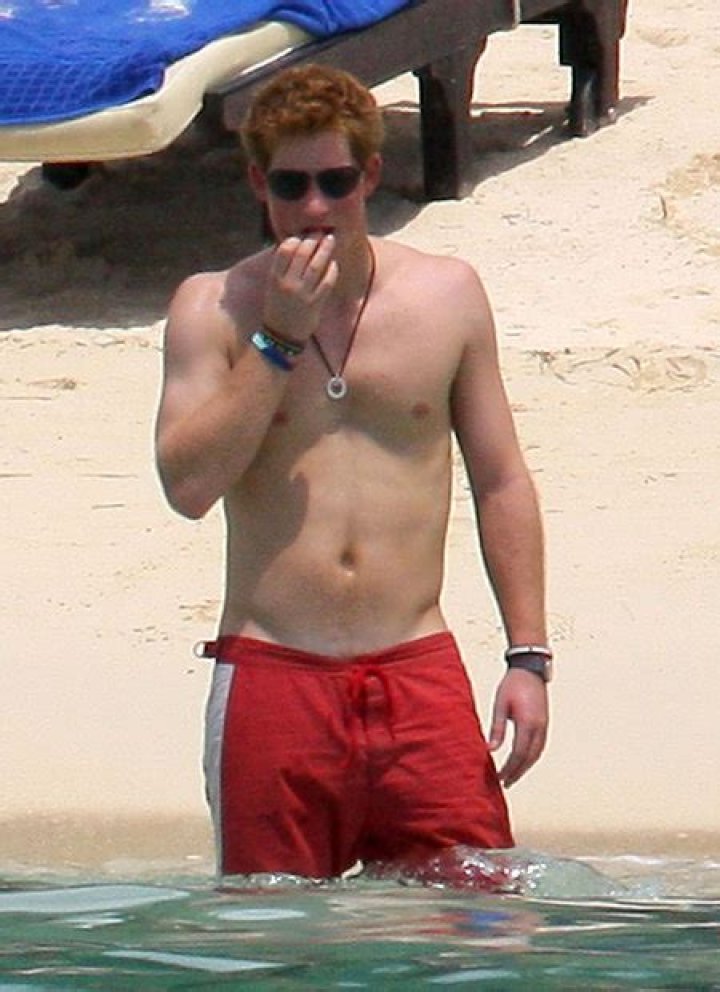 Prince Harry Goes Shirtless On The Beach — Pics