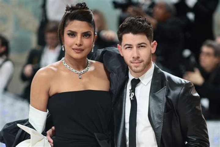 Priyanka Chopra Kisses Hubby Nick Jonas & Lounges In Halter Bikini On Romantic Getaway
