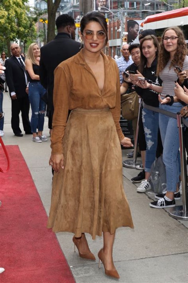 Priyanka Chopra Looks Gorgeous In Plunging Suede Top With Nothing Underneath