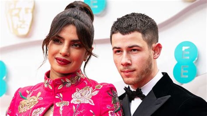 Priyanka Chopra Rocks Red Cutout Dress With Nick Jonas – Hollywood Life