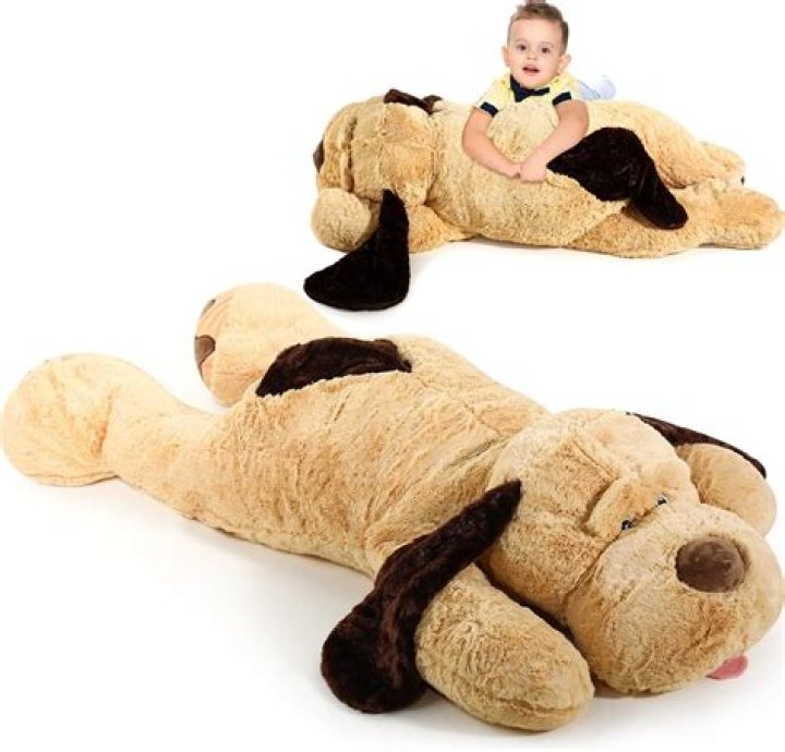 Psalm West, 1, Snuggles Family’s Stuffed Dog Toy In Adorable Pic