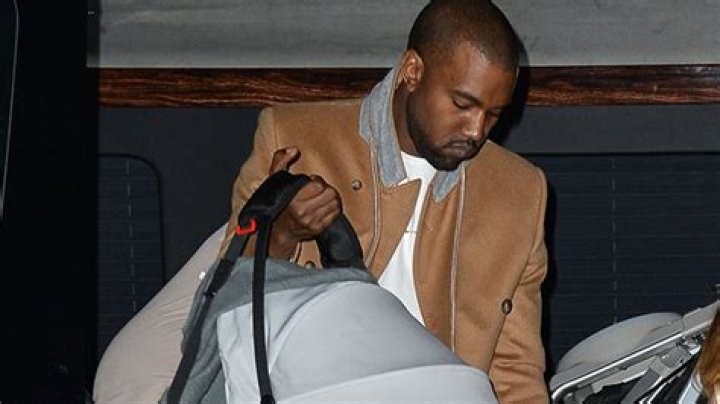 Psalm West, 6 Months, Gazes Up At Dad Kanye West On First Thanksgiving — Cute Pic