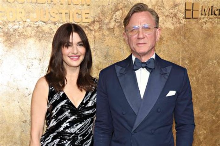 Rachel Weisz & Daniel Craig Are Adorable Doting Parents Out With Daughter For 1st Time
