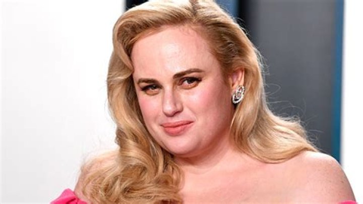 Rebel Wilson, 40, Races Up Sydney Opera House Stairs In Intense Workout With Shirtless Hunks