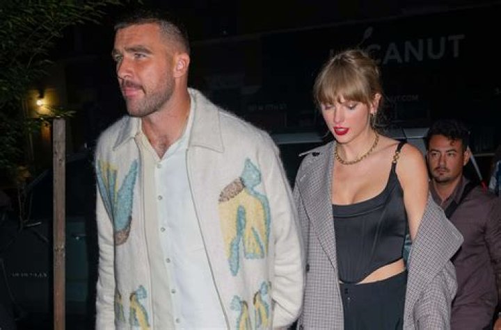 Rebel Wilson Gets A Sweet Kiss From BF Jacob Busch While Stunning In White Dress On Date Night