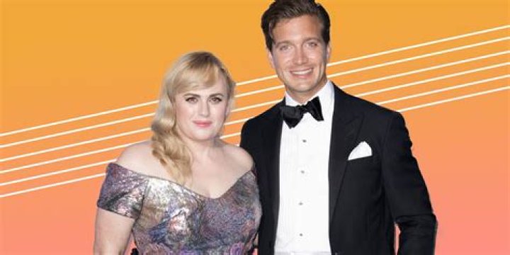 Rebel Wilson & Jacob Busch’s Romance Is ‘Getting Serious’ After An ‘Amazing’ Halloween Together