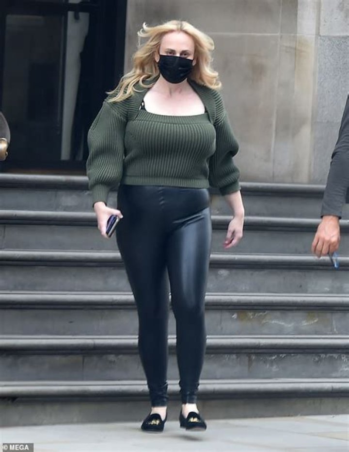 Rebel Wilson Shows Off Her Amazing 60 Lb. Weight Loss In Tight Leather Leggings On Movie Set