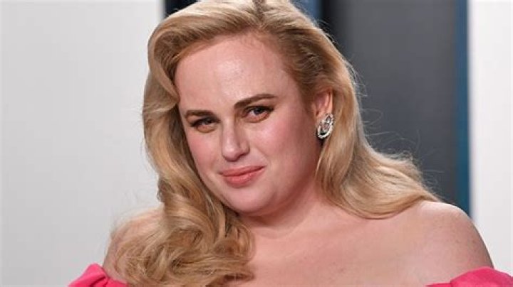 Rebel Wilson Strips Down To Sunbathe In Sultry New Video — Watch