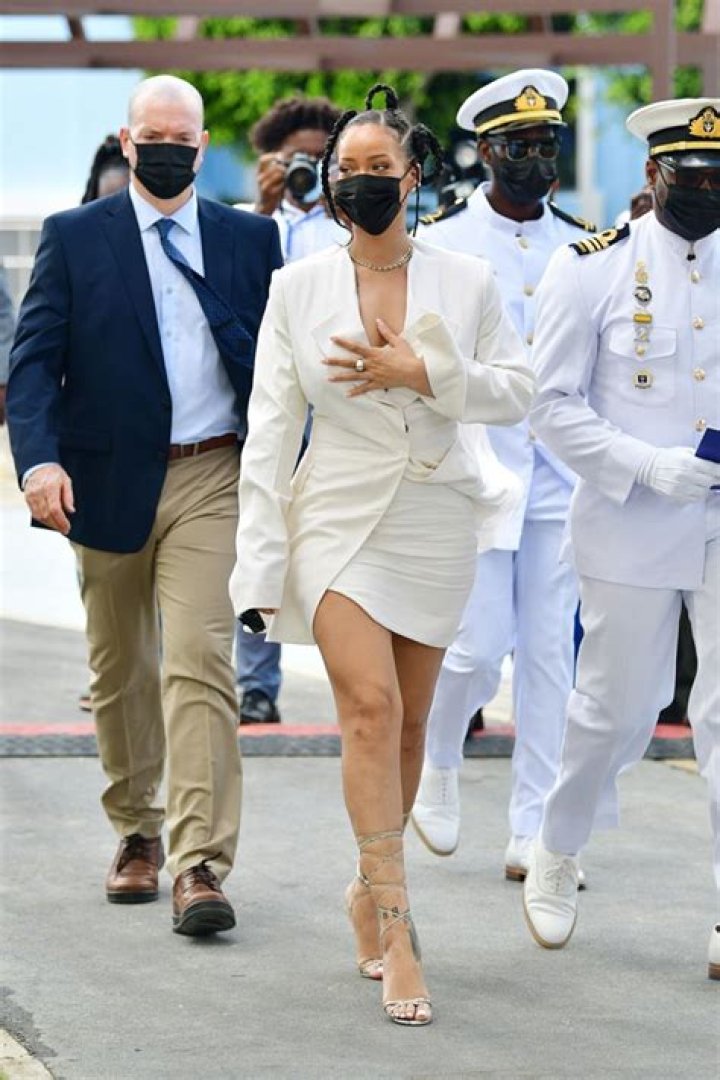 Rihanna Slays In Plunging White Mini Dress & Blazer As She Accepts National Hero Award In Barbados