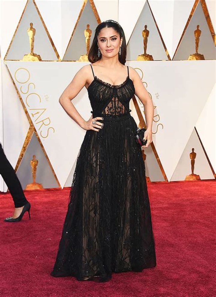 Salma Hayek, 54, Stuns In Red Swimsuit As She Lounges In A Hammock — See Pic