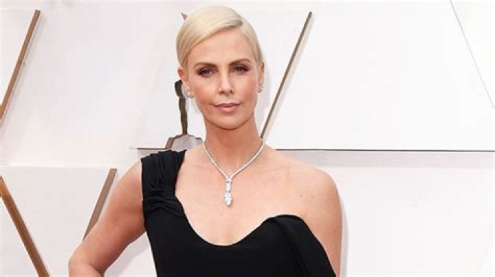 See Her One-Shoulder Black Dior Dress – Hollywood Life